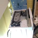 Rozebrana pralka Amica Dream Wash DAW 7123 DCiBT podczas wymiany fartucha
