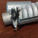 Spalona grzałka przepływowa w zmywarce Beko DFN 28321 X
