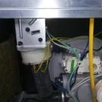 Wymiana pompy myjącej w zmywarce Whirlpool ADG9840/1