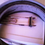 Wymiana fartucha i grzałki w pralce Bosch Vario Perfect Avatnixx 7 - widok na uszkodzone części