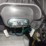 Wymiana grzałki w pralce AEG 914605906 01