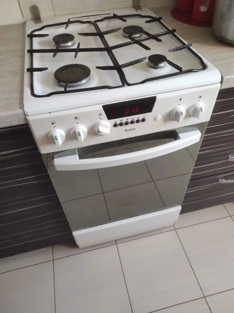 Wymiana iskrownika, termopary i zaworu w kuchence gazowej Amica