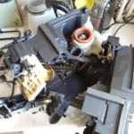 Wymiana popychacza zaparzacza w ekspresie do kawy DeLonghi Magnifica S ECAM22.115.B