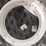 Nowa ramka zewnętrzna drzwi do pralki Gorenje WS5229 po otwarciu paczki z north.pl