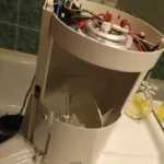 Wymiana grzałki w ekspresie Krups 309 PROAROMA