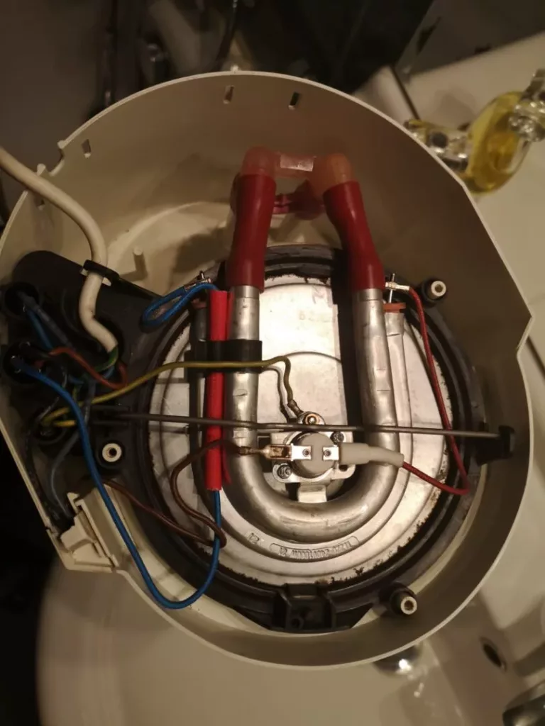 Wymiana grzałki w ekspresie Krups 309 PROAROMA