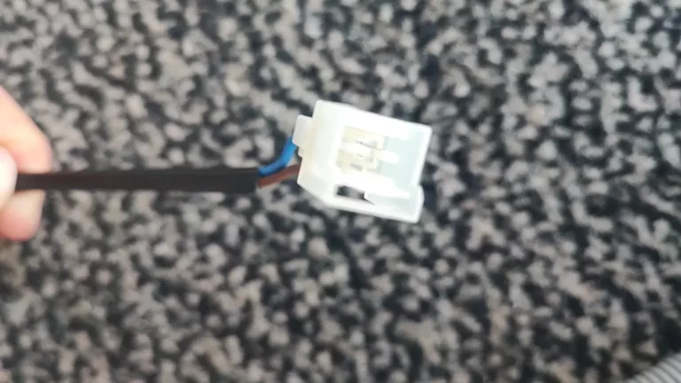 Kostka połączeniowa węża aquastop w zmywarce Hotpoint Ariston