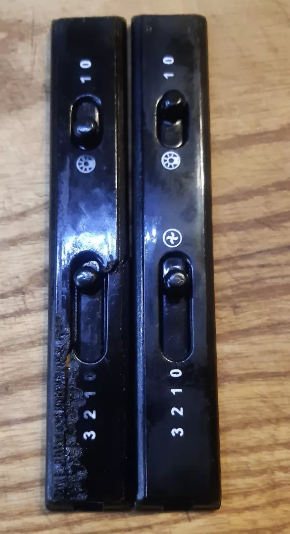 Porównanie pękniętego i nowego panelu przedniego przełącznika okapu Amica OKC 611 R
