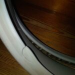 Cieknąca pralka AEG LAV50600 – rozerwana guma fartucha - naprawiaj, nie wyrzucaj