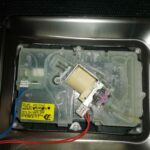 Uszkodzony dozownik detergentów zmywarki Electrolux TT803R3