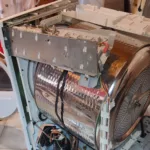 Przestał się kręcić bęben suszarki Siemens WT48Y780/04 - wymiana paska napędowego