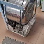 Bęben w suszarce Beko DPS 7343 X nie kręcił się - wymiana paska napędowego, ułożyskowania bębna, kondensatora rozruchowego i rolki bębna