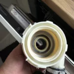 Wymiana grzałki pompy myjącej w zmywarce Electrolux EEM48321L - zmywarka nie grzała wody i nie suszyła naczyń