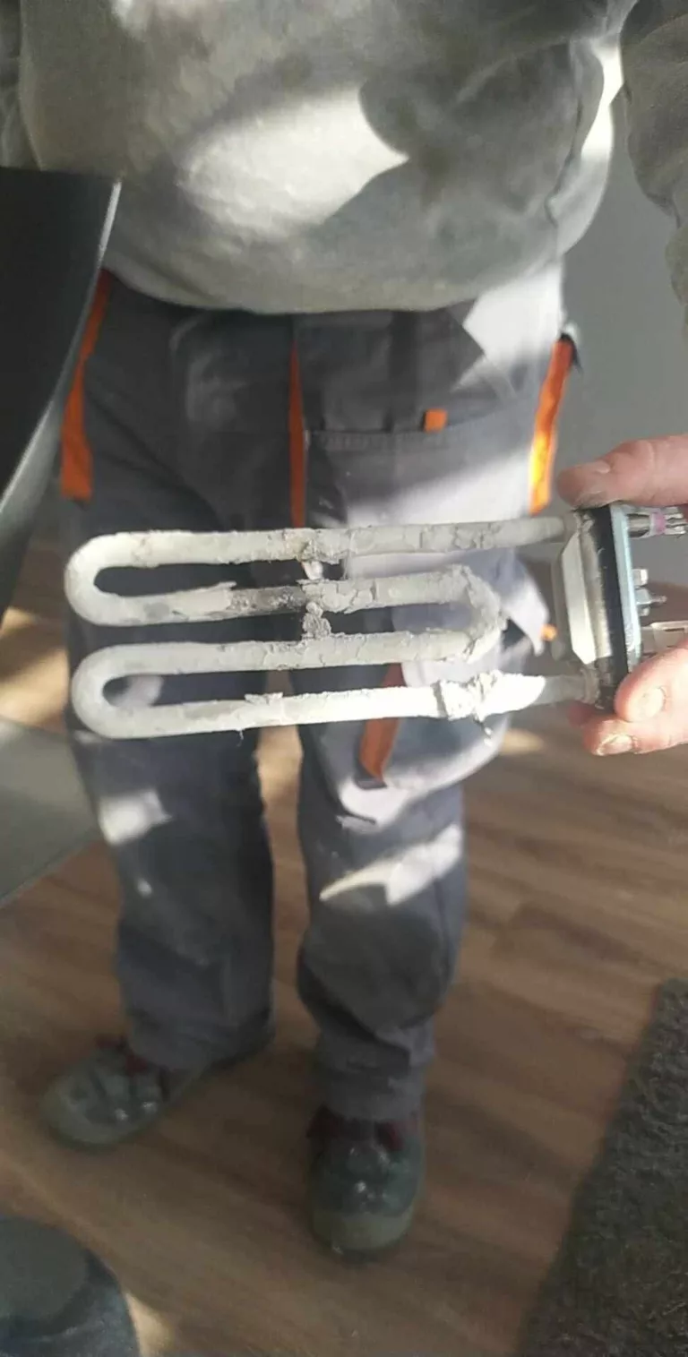 Upalona grzałka Electrolux EWS11054SDU po 7 latach - wymiana grzałki na nową