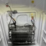 Grzałka parownika w lodówce Samsung RS7567THCSP/EF