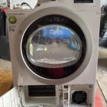 Rozkręcona suszarka Beko DS 7434 RX - wyjęty bęben
