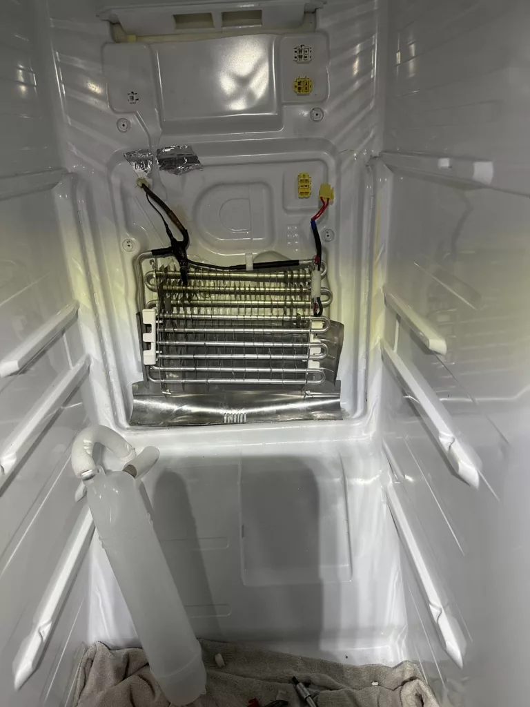 Wymiana grzałki parownika w lodówce Samsung RS7567THCSP/EF