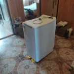 Przygotowanie do naprawy pralki Whirlpool TDLR 60220 759333949050