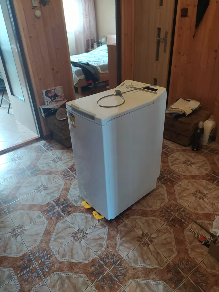 Przygotowanie do naprawy pralki Whirlpool TDLR 60220 759333949050