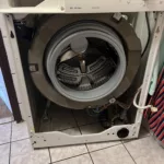 Pralka Bosch Classixx 5 WAA16160 nie grzeje wody - rozkręcona obudowa podczas wymiany grzałki