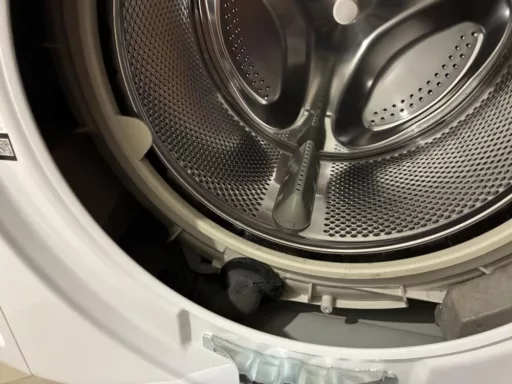 Zdejmowanie fartucha pralki Whirlpool FFD 9469 BCV PL